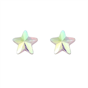 Macro detail of iridescent star-shaped silver stud earrings with multi-faceted crystal