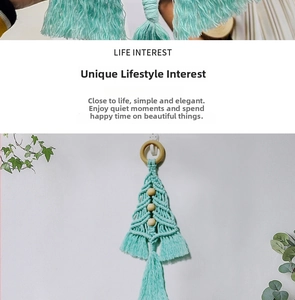 Detail of DIY Macrame Christmas tree wall hanging with mint green cord and wooden beads
