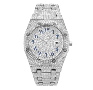Macro shot of silver iced-out watch featuring an octagonal bezel and Arabic numeral dial