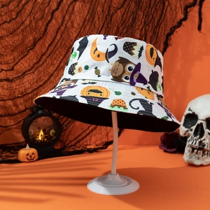 Reversible Halloween bucket hat with white pumpkin prints and black inner lining for parties