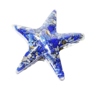 Starfish resin craft featuring blue and white crystal stones with gold flake accents