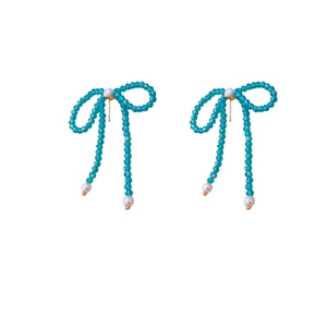 Elegant bow-shaped green crystal bead earrings with pearl accents and gold studs