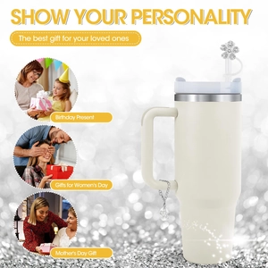 White insulated tumbler with floral charms as a personalized gift for various occasions