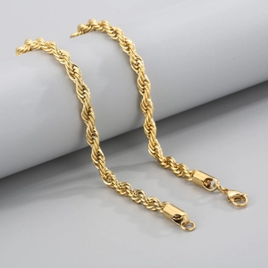 18K gold plated stainless steel rope chain necklace with dual lobster clasps on grey stand