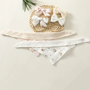 Soft cotton baby bib and bow headband set with floral print and muslin texture