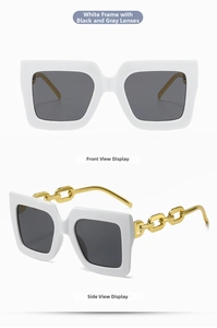 Detail of white square oversized sunglasses featuring chic gold metal chain temples