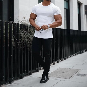 Close-up of white slim fit men's ribbed t-shirt showing texture and round neck detail