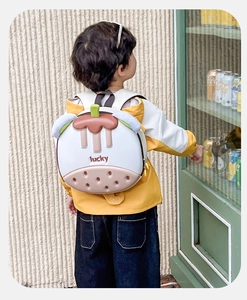 Cute biscuit-shaped kids backpack with lucky text and chocolate sauce design detail