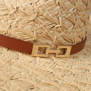French wide brim raffia sun hat with woven texture and a gold buckle leather band