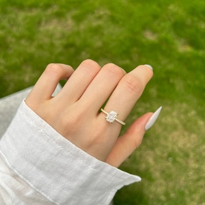Detail of s925 sterling silver ring with rectangular ice-cut zircon and small side stones