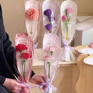Single rose packaging bags with romantic floral cards and ribbons for flower arrangements