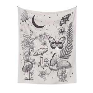 Detail of moon phase tapestry with black and white butterfly and floral illustrations
