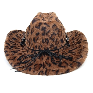 Close-up of leopard print faux fur texture and black rope detail on western cowboy hat