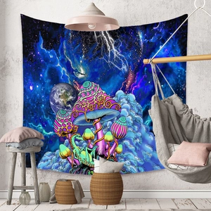 Detail of psychedelic mushroom tapestry with a small dragon and galaxy on a home wall