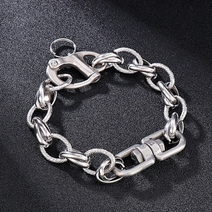 Detailed macro of stainless steel industrial chain link with textured wire and buckle