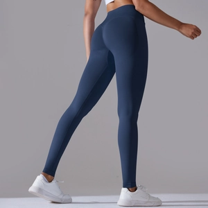 Close-up of seamless yoga pants highlighting peach hip lifting and dark blue texture