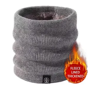 Unisex dark gray knitted winter neck warmer with thick fleece lining and Winter label