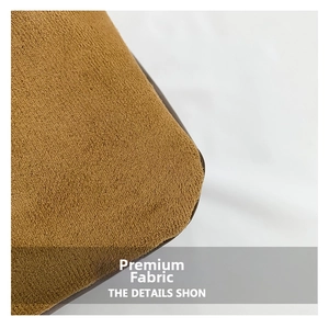 Close-up of caramel brown faux suede fabric showing soft texture and premium material