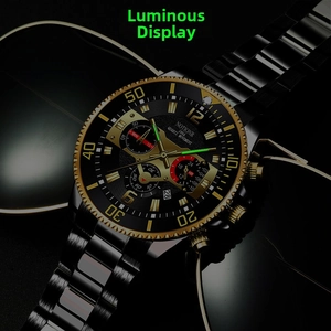 Detail showing bright luminous hands and markers on a luxury business quartz watch