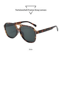 Detail view of double bridge aviator sunglasses featuring tortoise frames and gray lenses