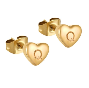 Detail of 18K gold-plated heart earring with letter Q engraving and butterfly backing