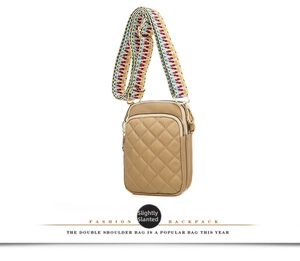 Khaki quilted waterproof nylon crossbody bag featuring a colorful woven shoulder strap
