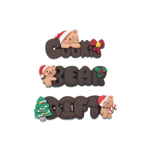 Three cute Christmas themed resin charms including cookie bear and gift tag for DIY crafts