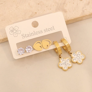 Detailed set of stainless steel earrings featuring gold heart, white flower, and zircon studs