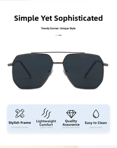 Detail of black polygonal pilot sunglasses with sleek double-bridge metal frame design