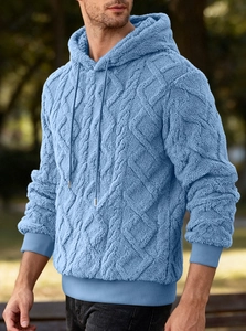 Close-up of sky blue double-sided fleece hoodie with thick diamond cable knit texture