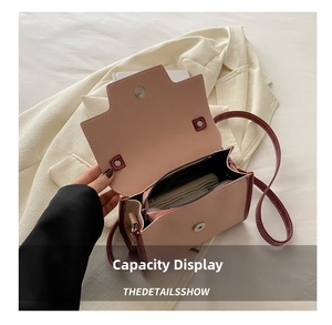 Internal view of patchwork square bag showing interior capacity and zipper pocket detail