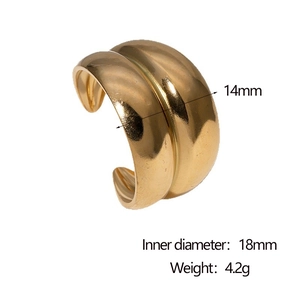Detailed view of minimal golden stainless steel wide band ring showing width and diameter