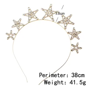 Elegant gold bridal headband with seven shimmering cubic zirconia star accents on a metal frame