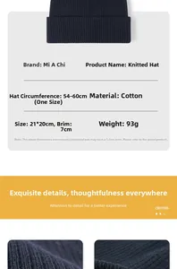 Detailed knit texture and size specifications of the navy cotton ribbed beanie