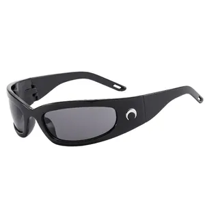 Futuristic Y2K black wrap-around sunglasses with metallic crescent moon logo on temple