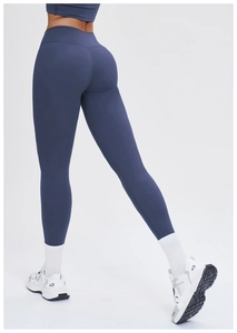 Detail view of high waist navy yoga leggings with body-sculpting and butt-lifting design
