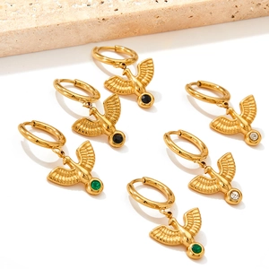 Three pairs of gold flying bird hoop earrings with black green and white zircon stones