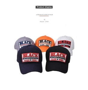 Close-up of baseball caps in five colors featuring Black Rebel embroidered patches