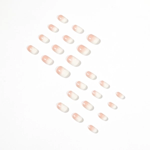Glossy pink and milky white ombre French press-on nails in 24-piece oval set