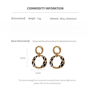 Infographic showing 3.9cm vintage leopard hoop earrings with rhinestone details