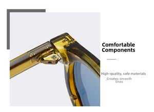 Detail of amber frame sunglasses showing durable metal hinges and screw construction