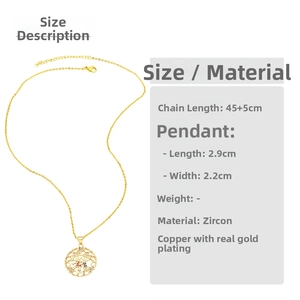 Detail view of gold necklace with girl and boy pendant and dimensions 2.9cm by 2.2cm