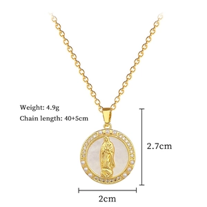 Detailed view of gold necklace pendant with portrait relief and pearl stone inlay