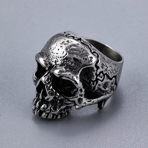 Punk style stainless steel skull ring with vintage silver finish in 45-degree view