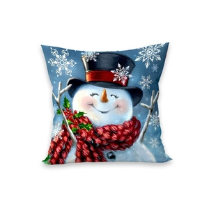 Christmas cushion cover with snowman print, red scarf and blue background on white surface