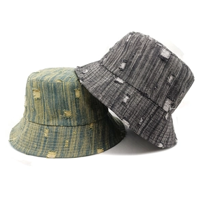 Vintage distressed denim bucket hats in dark grey and yellow-green with frayed edge details