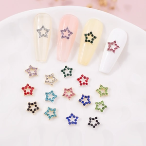 Holle ster nagelcharms met kleurrijke strasstenen in goud metaal voor manicure kunst
