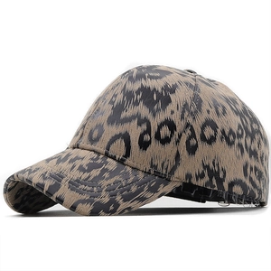 Minimalist leopard print leather baseball cap with classic brown and black animal patterns