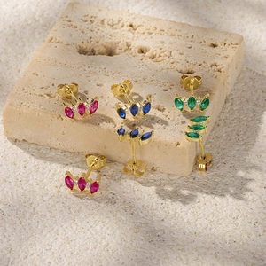 Detailed macro view of S925 silver marquise-cut colorful zircon stud earrings on stone