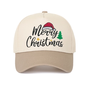 Close-up of Merry Christmas embroidery on a two-tone cotton baseball cap with holiday icons